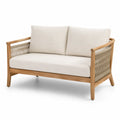 Dwuosobowa sofa z drewna teak z beżowymi poduszkami